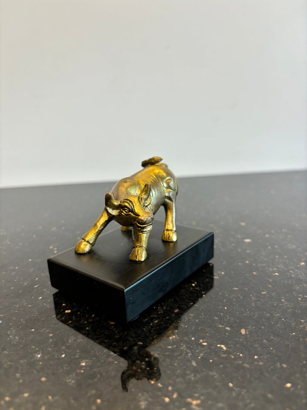 Bull with wooden board