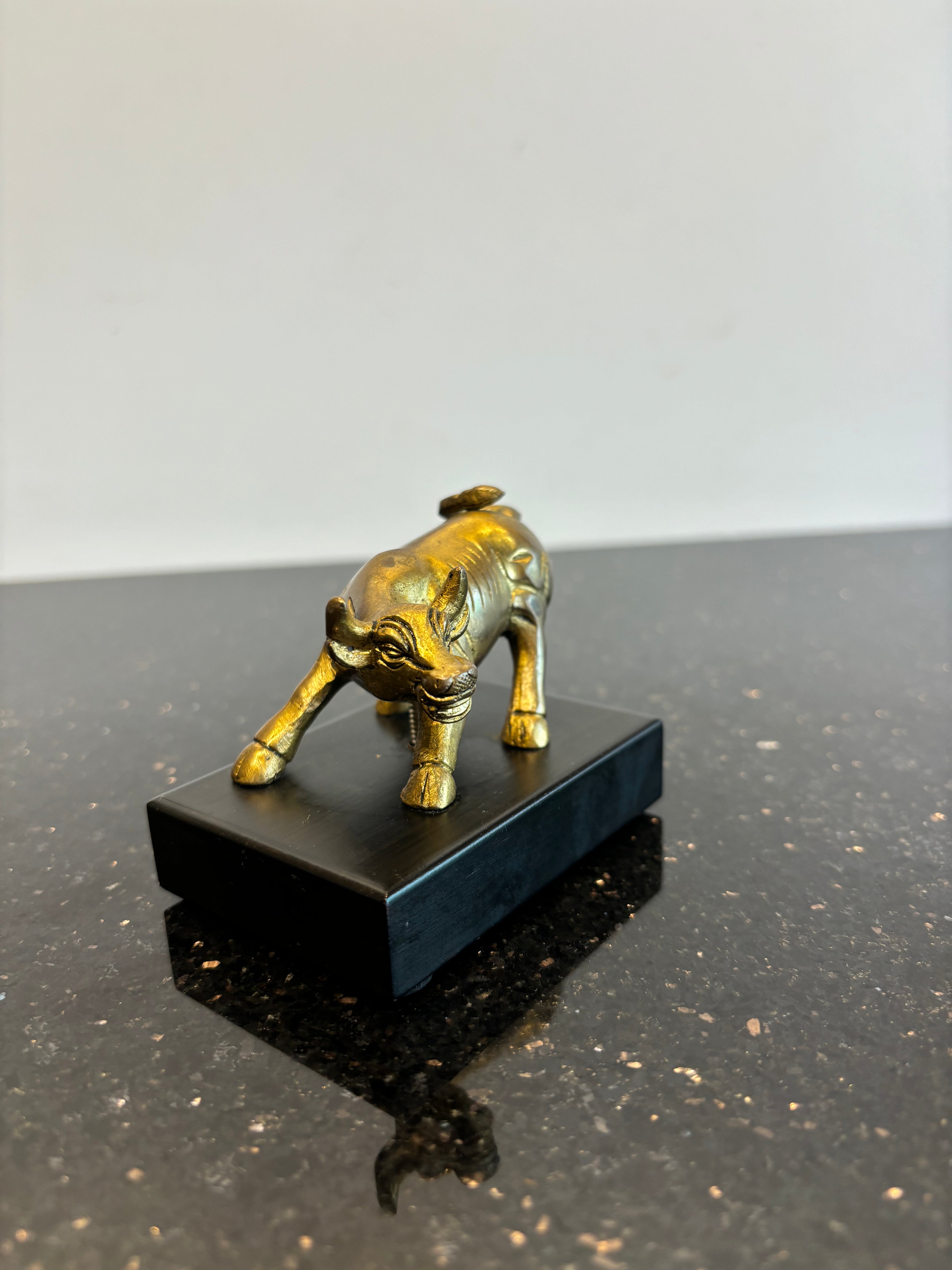 Bull with wooden board